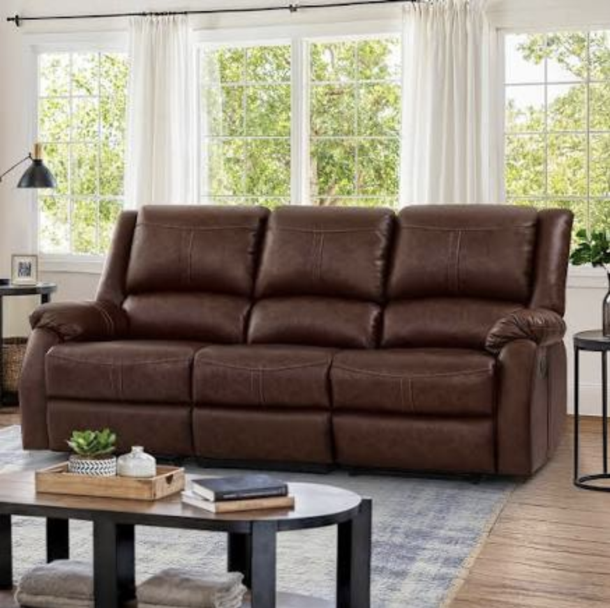 Reclining three cushion leather couch